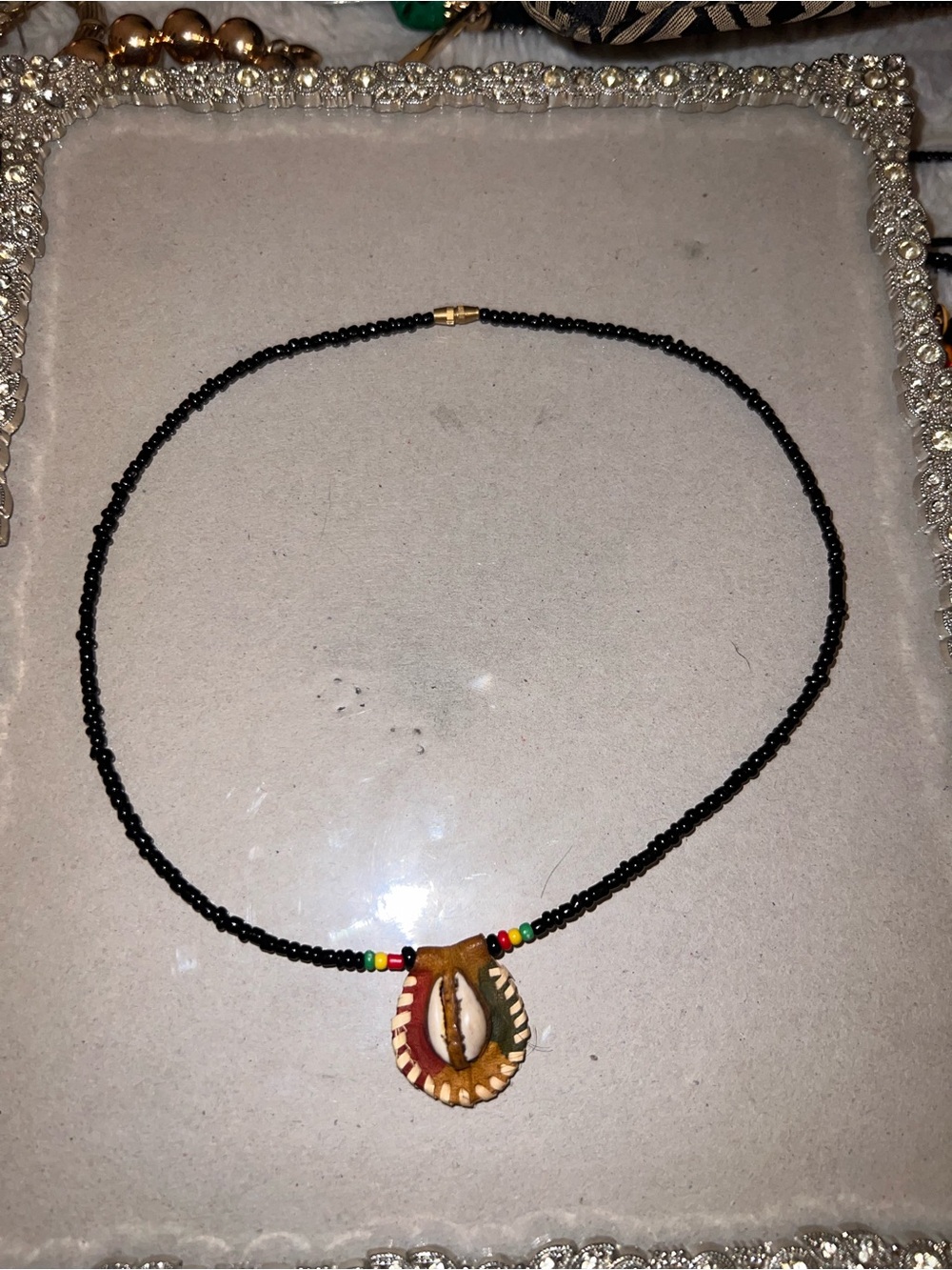 Handmade Black Beaded Necklace with Brown Shell Pendant